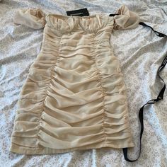 Cute Ruched Mini Dress With Off The Shoulder Sleeves. Us Size 2. Just Realized Illl Never Fit Into This No Matter How Hard I Try So It’s Time For It To Find Someone Else To Enjoy It! Beige Lined Mini Dress, Beige Ruched Mini Dress For Date Night, Beige Ruched Party Dress, Beige Ruched Dress For Party, Beige Lined Dress For Date Night, Date Night Beige Ruched Mini Dress, Cream Ruched Mini Dress For Party, Cream Ruched Mini Dress For Date Night, Knee-length Beige Lined Mini Dress