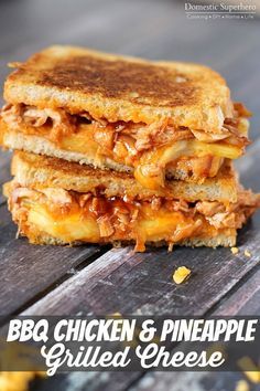 two grilled cheese sandwiches stacked on top of each other with shredded cheese around them