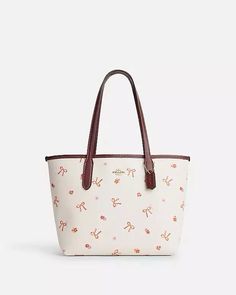 got this for christmas and OMG its amazingggg Spring Coach Leather Shoulder Bag, Casual Coach Bags In Coated Canvas, Casual White Coated Canvas Shoulder Bag, City Tote Bag, Mini City, Bow Bag, Girly Bags, Coach Tote, Fancy Bags