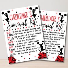 two cheerleader's survival kit printables on top of a wooden table