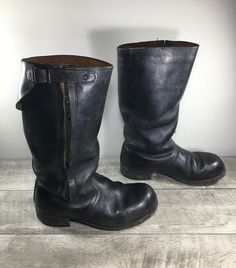 "Up on ETSY for buy it now is a pair of good condition, Vintage Jack Black Leather Combat Motorcycle Biker Riding Mens Boots. Fits a size 9.5. Soft toe. Leather uppers. Rubber and leather soles. Clean inside and out. Very well built and sturdy. Approximate Outside Dimensions: 12 inches heel to toe by 4.25 inches across the ball of footwear by 1.75 inches tall heels by 14.5 inches tall. Sold as is gently used.  Please check out the pictures. If you need more pictures or information regarding the Black Military Boots, Tall Heels, Boots Outfit Men, Top Shoes For Men, Combat Boots Men, Square Toe Western Boots, Old Boots, Brown Riding Boots, Canvas Boots