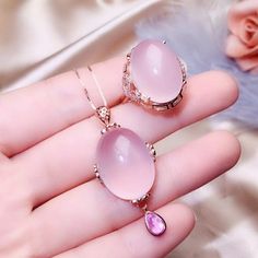 Welcome to Elegant Art Jewelry!  Stone: Natural Rose Quartz Stone Size: 13mm×18 Side Stone: Zircon Metal: 925 Sterling Silver Personalization: 9K/14K/24K/GOLD/SILVER/PLATINUM/ROSE-GOLD/WHITE GOLD. (Contact me)  Rose Quartz Pendant, Rose Quartz Cuff Pendant, 925 Sterling Silver Pendant, Oval Shape Pendant, Rose Quartz Pendant, Rose Quartz Engagement, Open Design Pendant, Rose Quartz Oval, Rose Quartz Natural, Pink Rose Quartz, Pink Rose Quartz, Gemstone Pendant, Rose Quartz Pendant, Bridesmaid Gi Pink Cabochon Jewelry For Anniversary, Fine Jewelry Pink Cabochon, Pink Oval Cabochon Jewelry For Wedding, Pink Oval Cabochon Wedding Jewelry, Pink Oval Jewelry Gift, Rose Gold Oval Jewelry For Mother's Day, Silver Pendent, Necklace Luxury, Luxury Ring