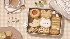 there are many cookies and pastries in the box on the table next to each other