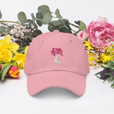 "Discover our exclusive unisex cap adorned with the embroidered emblem of Japan, the Cherry Blossom, with the flag proudly displayed on the back. This cap embodies Japanese style, combining elegance and national pride. Whether you're a fashion enthusiast or a fervent patriot, our cap is the perfect choice. Explore our collection now to add a touch of Japanese spirit to your outfit. Express your love for Japan with elegance! It has a low profile with an adjustable strap and a curved visor. * 100% Japan Souvenir, Fashion Enthusiast, Style Japonais, Camo Colors, Green Camo, Japanese Style, Trucker Cap, Cotton Twill, Cherry Blossom