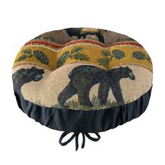 a round cushion with an image of two bears on it