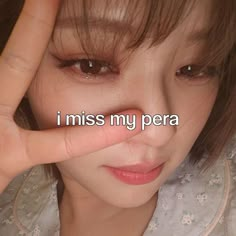 a woman making a hand gesture with the words i miss my pera in front of her face