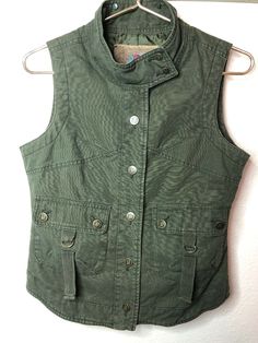 BB Dakota Vest Jacket Olive Army Green Button Up Sleeveless Size Medium Bust 16” waist 16” total length 23” Great Condition Track Page Views With Auctiva's FREE Counter Shipping I ship only to the 48 contiguous states. I ship within 24 hours from when the item is paid for. If a auction ends on a Friday or a weekend, I usually can't get an item shipped until Monday. I will consider shipping to Alaska or Hawaii if the item is under 3 pounds on a case-by-case basis. About Us I buy used items from e Green I, Sleeveless Jacket, Green Button, Bb Dakota, Me Clean, Army Green, Vest Jacket, Alaska, Sleeveless Top