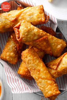 some fried food on a plate with dipping sauce