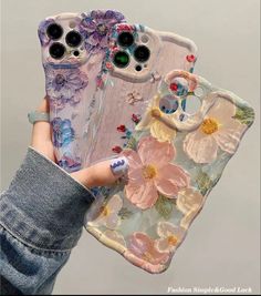 two cases with flowers on them are for $ 10 99 and one is for $ 9 99