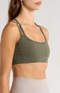 Summon powerful energy in this strappy sports bra finished with a breathable mesh back. Adjustable straps Partially lined 75% polyester, 25% elastane Machine wash, tumble dry Imported Strappy Back Sports Bra With Built-in Padding For Yoga, Athleisure Strappy Sports Bra With Built-in Bra, Strappy Sports Bra With Built-in Bra, Sports Bra With Built-in Padding For Light Exercise, Sporty Sports Bra With Strappy Back And Built-in Padding, Sporty Strappy Activewear With Built-in Padding, Strappy Back Yoga Activewear With Built-in Padding, Yoga Activewear With Strappy Back And Built-in Padding, Yoga Activewear With Built-in Padding And Strappy Back