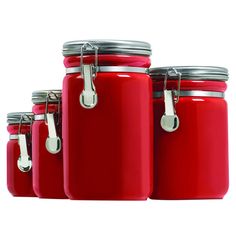 four red jars with silver lids are lined up