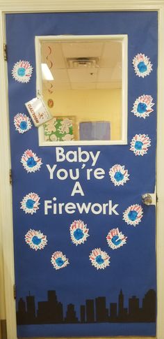 a door decorated with the words baby you're a firework