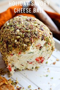 holiday savory cheese ball on a plate with crackers