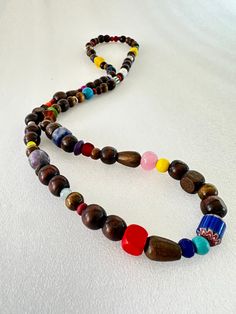 Boho style long necklace handmade with wood, Native American, gemstone, glass and ceramic beads. Bohemian Long Necklace With Wooden Beads, Multicolor Wooden Beads Necklace For Meditation, Multicolor Wooden Beads Long Necklace, Bohemian Long Necklace With Wooden Beads As A Gift, Multicolor Long Necklace With Wooden Beads, Bohemian Long Wooden Beaded Necklaces, Bohemian Long Wooden Beaded Necklace, Brown Long Beaded Necklace With Wooden Beads, Long Brown Beaded Necklace With Wooden Beads