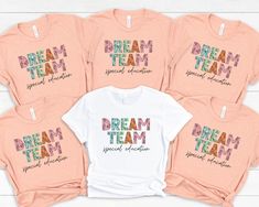 Dream Team Special Education Shirt, Sped Teacher Group T-Shirt UNISEX T-Shirt Bella+Canvas 3001. Super soft cotton and excellent quality print .: White:100% cotton Heather Peach: 52% cotton and 48% polyester .: Light fabric (4.2 oz/yd² (142 g/m .: Runs true to size ❤️ Returns & exchanges I don't accept returns, exchanges, or cancellations All sales are final. Thank you for supporting our small business! Pink Team Spirit T-shirt With Short Sleeves, Pink Cotton T-shirt With Team Spirit Style, Gift For Kindergarten Teacher, Team Shirt Designs, Team Tshirt, Education Shirts, T Shirts Cute, Special Ed Teacher, Kindergarten Teacher Shirts