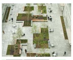 an aerial view of people walking and sitting in the middle of a courtyard with plants growing on it