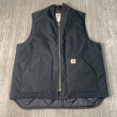 Vintage 2000s Carhartt Workwear Carpenter Heavy Duty Winter Spring Season Y2K Aesthetic Black Zip Up Vest Extra Large Tall Mens  Condition:  Fair Used Condition  = Staining On The Front Of The Vest Due To Age And Wear  Measurements: Please see photos above for all measurements IF YOU BUY TWO OR MORE ITEMS USE THE CODE BUNDLE @ CHECK TO SAVE 20% WE SHIP WITHIN 24 HOURS AFTER PURCHASE! Please be aware that we do not offer free returns!! The Buyer is responsible for the cost of the return label. Follow us on TikTok & Instagram @findsnostalgic and tag us in your finds Y2k Aesthetic Black, Mens Vest Casual, Carhartt Vest, Zip Up Vest, Carhartt Workwear, Mens Vests, Aesthetic Black, Black Zip Ups, Vest Outfits