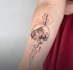 a person with a tattoo on their arm