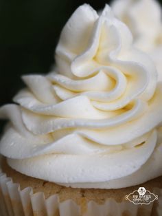 a cupcake with white frosting on top