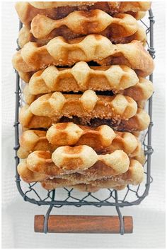 a stack of waffles sitting on top of a metal rack next to each other