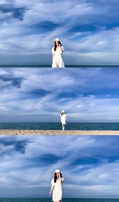 a woman standing on top of a beach next to the ocean wearing a white dress