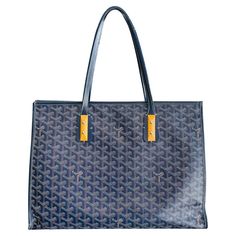 Goyard Marquises Goyardine Coated Canvas Tote Bag Blue shoulder bag crafted in Goyardine canvas and designed with signature hand-painted monogram pattern. Detailed with smooth leather trims, dual handle and light wooden details. Featuring zipped top leading to spacious fabric lined interior. Size – Height 29cm, Width 40cm, Depth 16cm Condition – Fair (Visible signs of wear to the handles, trims, corners and interior) Composition – Coated Canvas Comes with – Dust Bag Small Goyard Tote, Navy Goyard Tote, Goyard Artois Mm, Goyard Anjou Mini Grey, Goyard Mini Anjou Blue, Hand Painted Monogram, Blue Shoulder Bag, Monogram Painting, Monogram Pattern