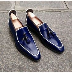 Handmade Navy Blue Square Toe Leather Moccasins, Blue Leather Dress Shoes Leather Tassel Loafers With Round Toe For Party, Party Leather Tassel Loafers With Round Toe, Elegant Tassel Loafers With Leather Sole For Party, Classic Leather Tassel Loafers For Party, Blue Tassel Loafers With Rubber Sole, Classic Blue Slip-on Oxfords, Blue Tassel Loafers For Galas With Round Toe, Blue Wingtip Tassel Loafers With Leather Sole, Leather Tassel Loafers With Leather Sole For Party