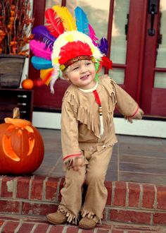 This listing is for a handmade Native American Indian boy costume made with faux suede , beads and faux fur accents modeled by one very cute toddler. It is hand made of high quality materials to last for years of fun play. The set includes, 1 boy's shirt, 1 boy pants See last picture for a close up and true color of the material! I will provide a headdress as an extra accessory free of charge ,but please note it is not made by me and unfortunately not the quality I wish it would be. If you prefe Handmade Halloween Costumes, Kids Part, Indian Boy, Halloween Boys, Indian Inspired, Boy Costumes, Halloween Costumes For Kids, Native American Indians, American Indian