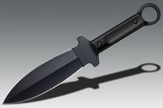 a large knife with a black handle on a gray background