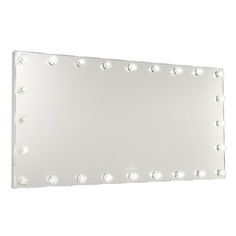 a large mirror with lights on the side of it's face and bottom half