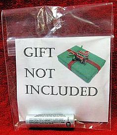 a gift not included sign is wrapped in plastic