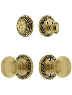 three brass door knobs and two handles