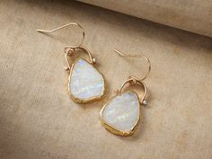 Our elemental Livi Earrings are crafted with a gold-edged moonstone and gilded satellite chain as a twinkling accent to complete the look. Handcrafted by LuLu Designs in Mill Valley, California, our exclusively curated jewelry collection showcases unique designs that combine organic textures and traditional elements, celebrating the natural beauty of hand-worked metals and stones. Mill Valley California, Organic Textures, Mill Valley, Unique Earrings, Twinkle Twinkle, Gold Vermeil, Moonstone, Silver Gold, Natural Beauty