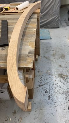 a wooden bench being constructed in a workshop