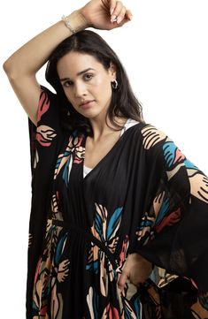 The light and breezy crepe construction defines a whimsy caftan covered in an island bloom print. V-neck Three-quarter sleeves 100% rayon Hand wash, line dry Imported Three Quarter Sleeves, The Light, Three Quarter, Nordstrom Rack, Hand Wash, Nordstrom, V Neck, Black