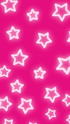 white stars are on a pink background with bright light effects in the middle and bottom