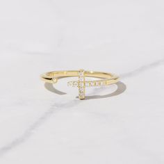 Dainty sideways cross ring featuring a pavé side ways cross, super cute and dainty. Ideal for stacking, but also beautiful on its own! - - - D E T A I L S - - - * Made of 925 Sterling Silver * We use a THICK plating of 14k Gold, Rose Gold, or Rhodium * Available in sizes 4-10 * Sideways cross measures 10mm long * Made of the highest quality CZ's for an authentic look Ring Sizer- https://www.etsy.com/listing/1240904225/ring-sizer-reusable-ring-sizer-plastic?click_key=b5e074cfb419bcfddc2d9f2ce4b2f Open Cuff Ring, Purity Ring, Chunky Earrings, Zierlicher Ring, Cuff Ring, Ring Ideas, Cuff Rings, Cross Ring, Ring Sizer