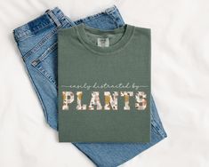 two t - shirts with the words plant's printed on them next to each other