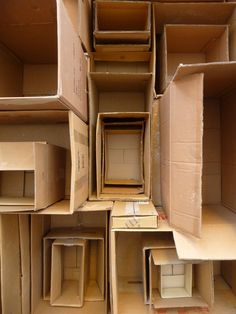 several cardboard boxes stacked on top of each other