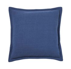 the blue linen pillow is shown on a white background, it has a square shape