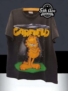 Garfield Aliens Single Stitch t shirt - Vintage Band Shirts Garfield T Shirt, Vintage Band Shirts, Stitch T Shirt, Anime Tees, Movie Tees, Band Shirts, Comic Strip, Front Design, Band Tees