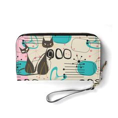 Unleash a wave of vintage charm with our Atomic Cat Wallet, crafted in sleek PU leather and adorned with mid-century modern motifs. This wallet features a vibrant mix of atomic starbursts and boomerang shapes in shades of retro pink, turquoise, and black, offering a fun, contemporary twist. It's the perfect accessory to inject a splash of personality and color into any outfit, combining practicality with playful, era-appropriate style! * Material: Crafted from high-quality PU leather for luxury. Atomic Cat, Cat Wallet, Turquoise And Black, Leather Accessory, Pink Turquoise, Leather Accessories, Vintage Charms, Atom, Soft Leather