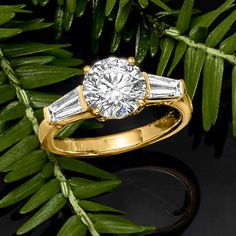 Ross-Simons - 2.50ct t. w. Lab Grown Diamond Three-Stone Ring Round Cut in 14kt Yellow Gold. Size 9. Stellar sparkle. Impressive value. Our radiant three-stone ring features a 2.00 carat round brilliant-cut lab-grown diamond center flanked by .50 ct. t. w. tapered baguette gems of the same kind. Finely crafted in polished 14kt yellow gold. Lab-grown diamonds are identical to mined diamonds according to their optical, physical and chemical properties. All Ross-Simons lab-grown diamond jewelry in 14kt gold and platinum includes an IGI Laboratory-Grown Diamond Report to verify color, clarity and carat weight. 1/4" wide. Lab-grown diamond ring. Diamond birthstones are the perfect gift for April birthdays. Gia Certified Yellow Gold Diamond Ring, Gia Certified Round Cut Yellow Gold Diamond Ring, Physical And Chemical Properties, Diamond Birthstone, Three Stone Rings, Three Stone, 14kt Gold, Lab Grown Diamonds, Diamond Jewelry