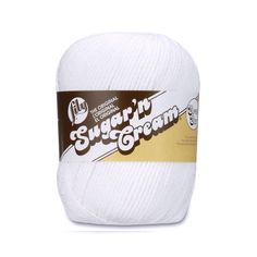 white ball of yarn with the words sugar in cream written on it's side