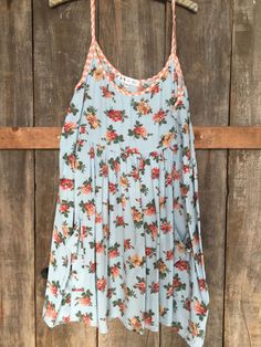 "Baby Blue Floral babydoll Dress with Contrasting Trim and Straps. Adorable with Adjustable Straps! Great alone or with a pair of Pants, Shorts, or PantalOOnies! Perfect to wear to the beach over your bathing suit, then just grab a pair of heels or boots and you are ready to go out for the night! They look great with our Melony Lacey PantalOOnie's! Made in super soft, light and cozy Rayon Challis! Just a perfect easy breezy dress that you will wear again and again! Perfectly adorable Maternity D Cute Blue Loungewear Dress, Cottagecore Babydoll Dress, Fairycore Babydoll Dress, Spring Floral Print Sleeveless Nightgown, Sleeveless Floral Print Nightgown, Hollister Blue Babydoll Top, Floral Babydoll Dress, Breezy Dress, Babydoll Dress