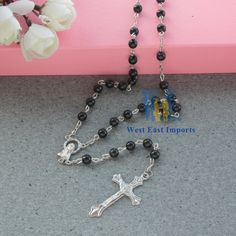 "12 PCS Funeral Favors for Memorial service. give these beautiful black rosaries to guests and family at the funeral. Black Rosary Favor - In Loving Memory, Rest in peace, Funeral thank you gift, Celebration of life, Sympathy gift, and memorial Condolence. Each black rosary comes in a white organza gift bag with black gold ribbons with cross charm or white flower. Give these beautiful rosaries to guests and family at the funeral, memorial service, anniversaries, or celebration of life. SIZE: 19\ Black Spiritual Rosary Bracelet With Cross, Black Beaded Cross Rosary, Spiritual Black Rosary With 108 Beads, Black Beaded Cross-shaped Rosary, Gift Black Rosary With 8mm Beads, Black Cross Rosary As Gift, Black Rosary With 108 Beads As Gift, Black Rosary Bracelet As A Gift, Christening Party Favors