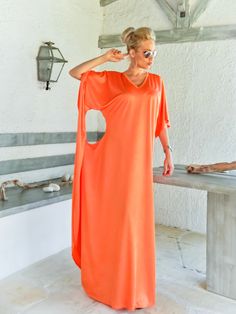 NEW Orange Kaftan / Orange Maxi Dress / Summer Maxi Dress / Summer Kaftan / Plus Size Caftan / Cut out Maxi Dress / Caftan / Kaftan / Summer dress / Abaya / #35269 NEW .... MAXI DRESSES Colorful Maxi dresses for stunning and comfortable look...! A must have for all seasons ..! Wear it with flat or heels , and be feminine and elegant ...! - Handmade item - Materials : crystal jersey - The model wears : size - small, color - Coral Orange - Fit : Loose fit - Length : 150 cm / 59 inches . ** If you Orange Short Sleeve Beachwear Dress, Orange Tunic Dress For Beach Cover-up, Orange Long Maxi Dress For Beachwear, Floor-length Orange Dress For The Beach, Orange Floor-length Beach Dress, Floor-length Orange Beach Dress, Orange Tunic Dress For Vacation, Long Orange Summer Dress, Orange Kaftan