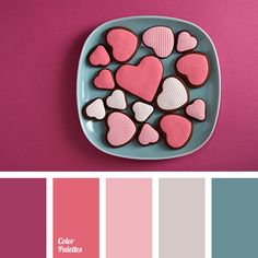 a plate filled with hearts on top of a pink and blue color scheme for valentine's day