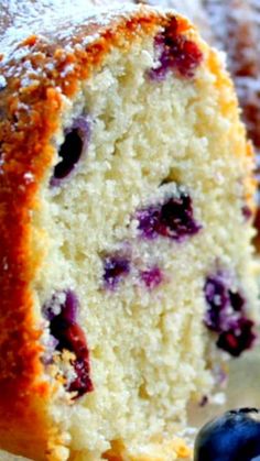 a blueberry bundt cake is cut in half