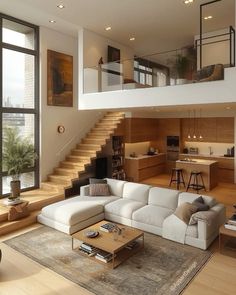 a living room filled with furniture next to a stair case in front of a window